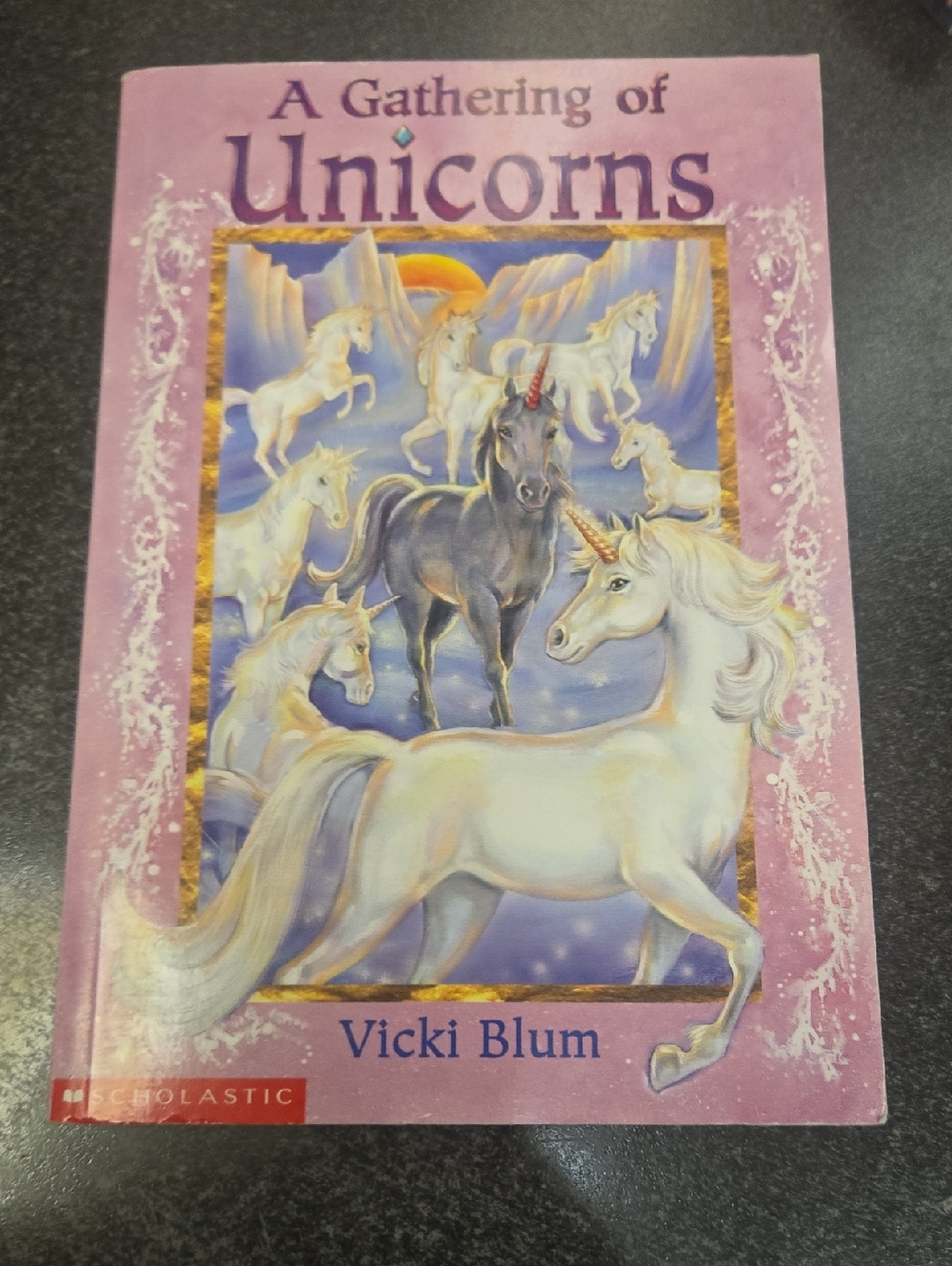 Scholastic Pink Paperback Featuring Illustrated Unicorns
